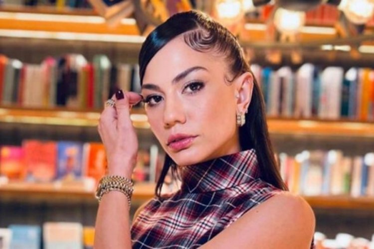 Demet &Ouml;zdemir mini şortuyla poz verdi