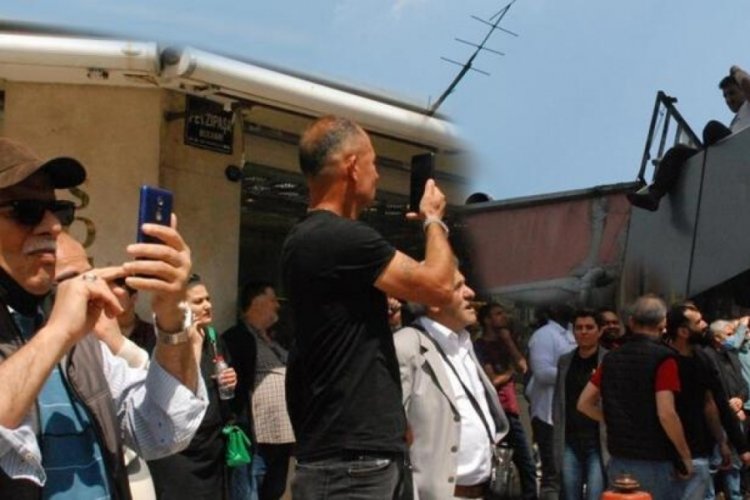 İzmir'de gen&ccedil; adam &ccedil;atıya &ccedil;ıktı, vatandaşlar telefona sarıldı