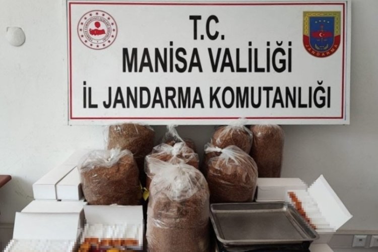 Pazarda bandrols&uuml;z t&uuml;t&uuml;n satarken yakalandı