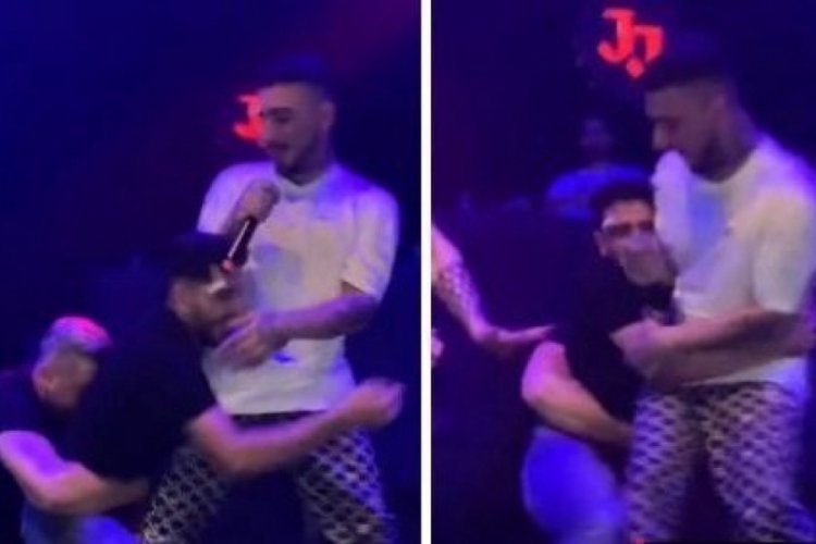Sahnesinde hayranının saldırısına uğrayan Uzi, konserini yarıda kesti