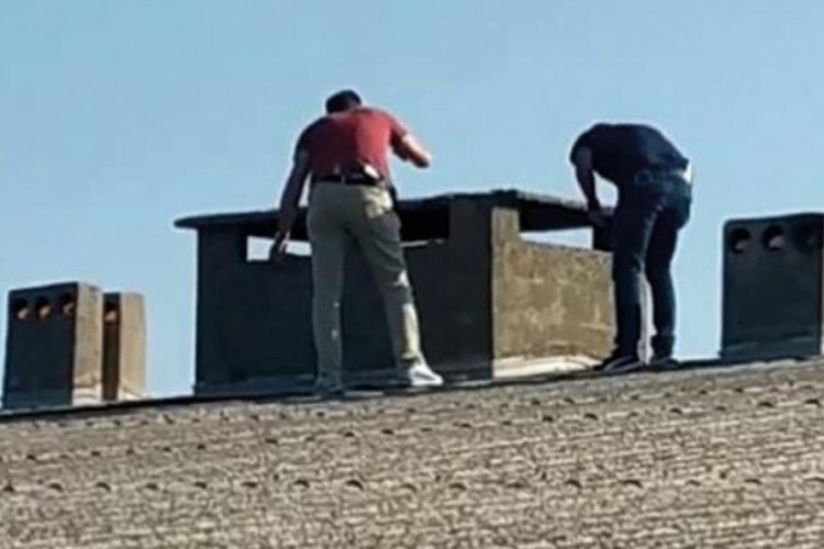 Arkadaşını &ouml;ld&uuml;rd&uuml;, iş yerinin bacasından &ccedil;ıktı