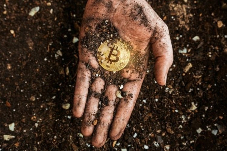 8 bin Bitcoin'i &ccedil;&ouml;pe atan Howells'ın umudu robot k&ouml;peklerde