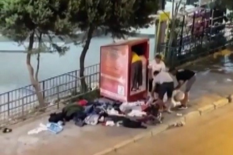 G&ouml;r&uuml;nt&uuml;ler şok etti! İhtiya&ccedil; sahipleri i&ccedil;in konulan giyim kutusunu soydular