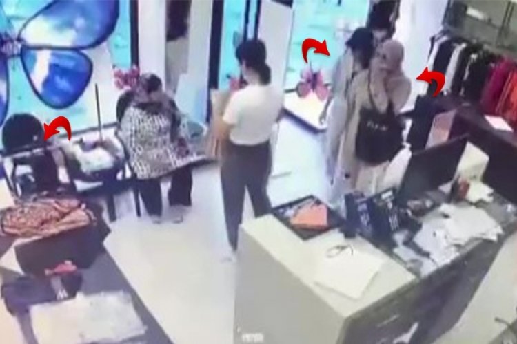 Alışveriş yapan turistin &ccedil;antasını &ccedil;aldılar