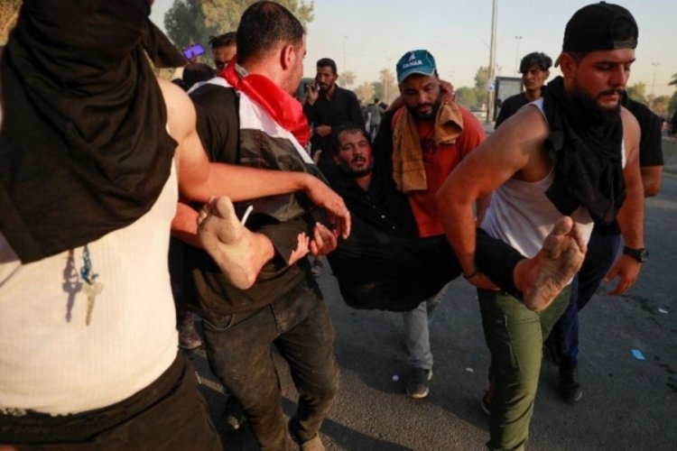 Irak'taki protestolar s&uuml;r&uuml;yor: 2 &ouml;l&uuml;, 19 yaralı