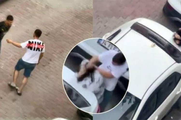 Sevgilisini sokak ortasında yumruklayan ş&uuml;pheli g&ouml;zaltına alındı