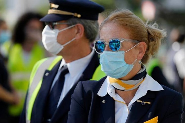 Almanya'da u&ccedil;akta maske zorunluluğu kalktı
