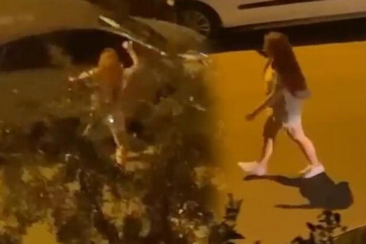 Antalya'da sinir krizi ge&ccedil;iren kadın hıncını otomobilden &ccedil;ıkardı