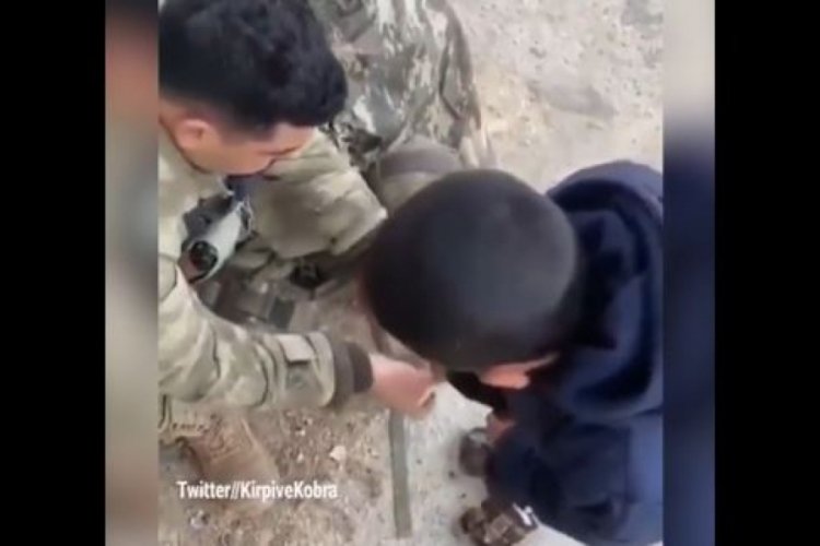 Mehmet&ccedil;ik kendi &ccedil;orabını &uuml;ş&uuml;yen &ccedil;ocuğa giydirdi