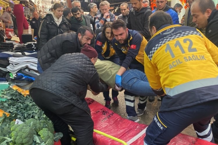 Bursa'da pazarcıyı bı&ccedil;aklayan perdeci esnaf yakalandı