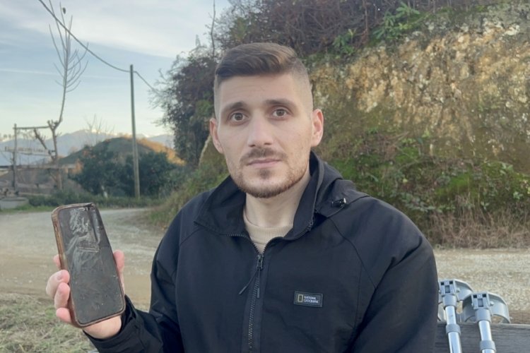 Uzman &ccedil;avuş cebindeki cep telefonu sayesinde kurtuldu