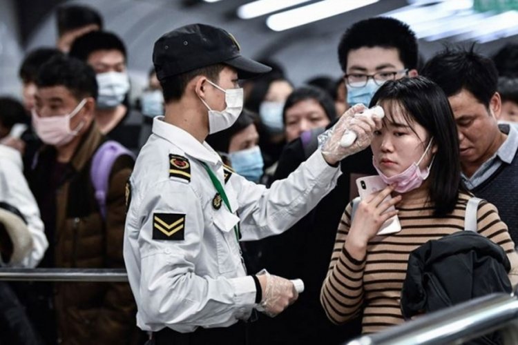 &Ccedil;in, Hong Kong'dan gelen yolculara karantinayı kaldırıyor!