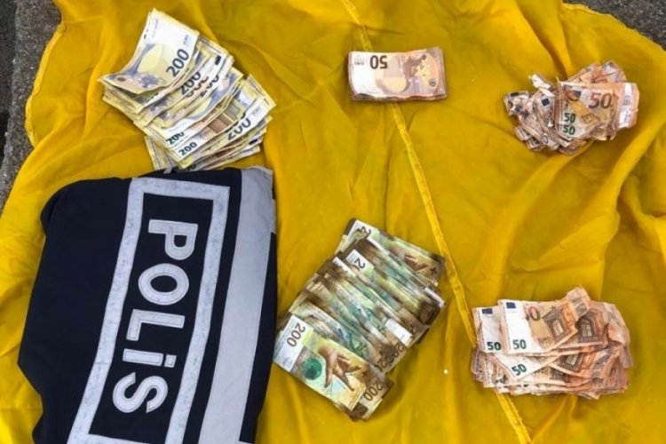 &Ccedil;ocuğunun eğitimi i&ccedil;in biriktirdiği parasını polis teslim etti