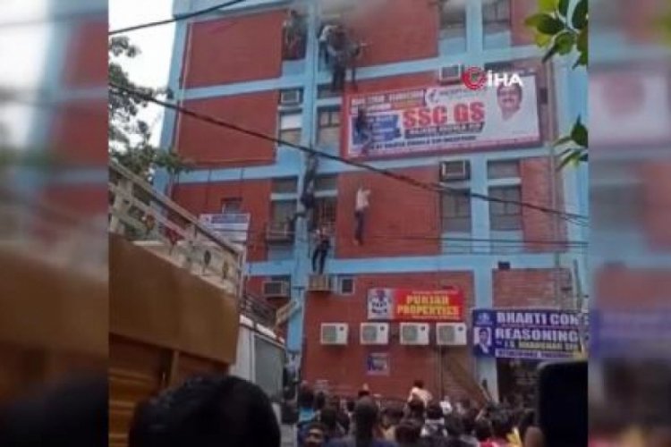 &Ouml;ğrenciler yangından ka&ccedil;mak i&ccedil;in 3'&uuml;nc&uuml; kattan atladı: &Ccedil;ok sayıda yaralı var