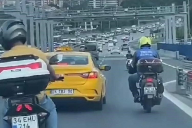 İstanbul'da 15 Temmuz Şehitler K&ouml;pr&uuml;s&uuml;nde taksi ile motosikletli kavgası