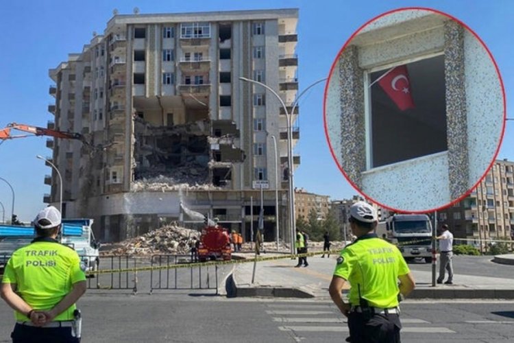 Diyarbakır'da ağır hasarlı binanın yıkımı T&uuml;rk bayrağı i&ccedil;in durduruldu