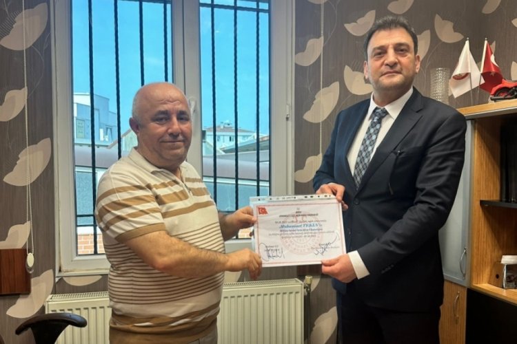 MHP Bursa İl Başkanı Muhammet Tekin mazbatasını aldı
