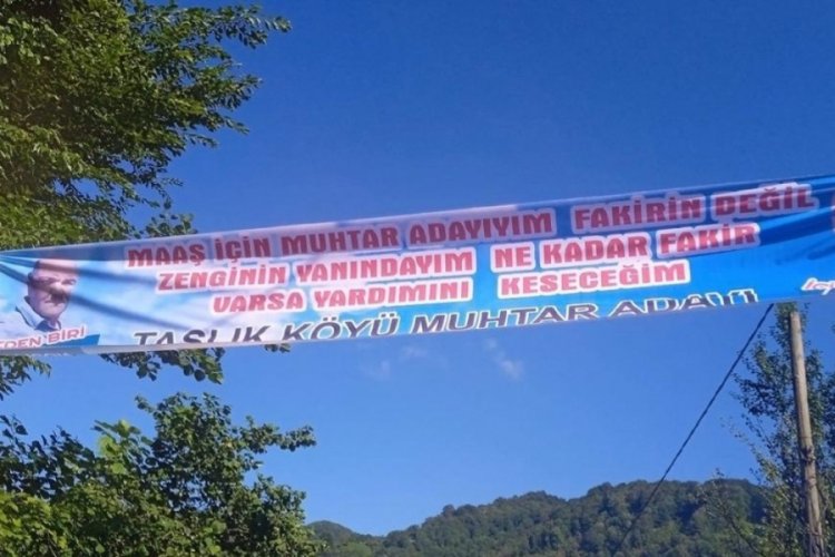 Giresun'da muhtar adayının se&ccedil;im pankartı dikkat &ccedil;ekti! "Maaş i&ccedil;in muhtar adayıyım"
