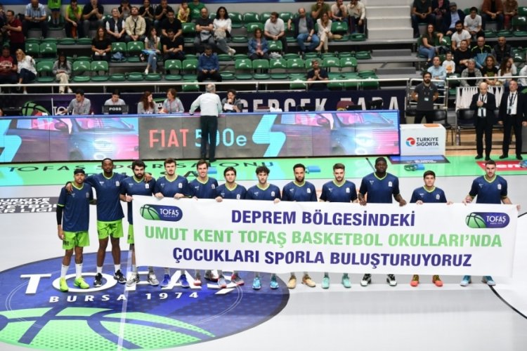 Tofaş'tan 'Umut kent' pankartı