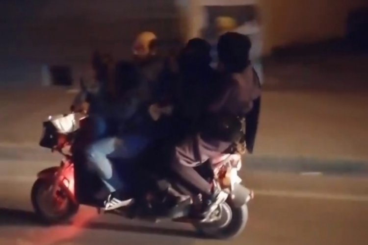 Bursa'da ilgin&ccedil; g&ouml;r&uuml;nt&uuml;! Yarım d&uuml;zine bir motosiklete bindiler