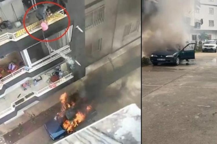 Mersin'de  alev alan otomobile, balkondan m&uuml;dahale etmeye &ccedil;alıştı!