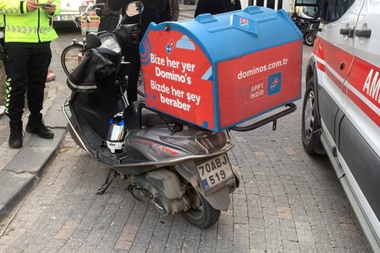 Karaman'da otomobille &ccedil;arpışan motokurye yaralandı