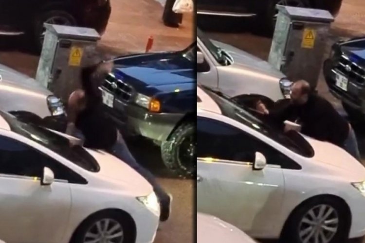 Eski kız arkadaşının otomobilinin &uuml;zerine &ccedil;ıktı, camlarını kırdı