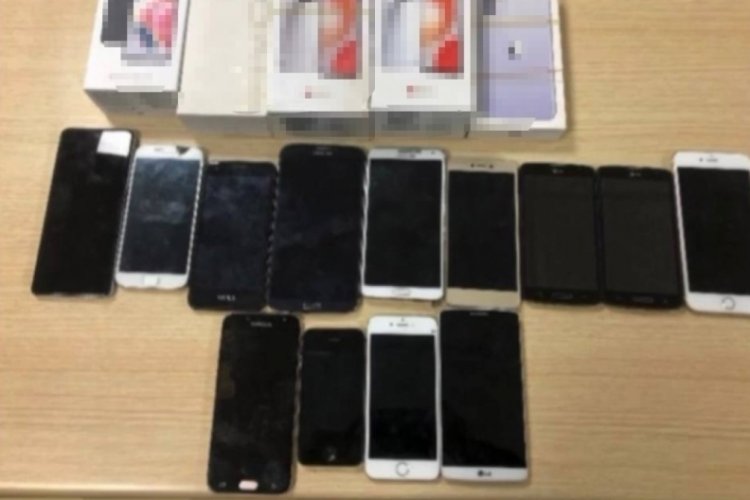 Osmaniye'de duvarı delip 1 milyon liralık cep telefonu &ccedil;almışlardı...