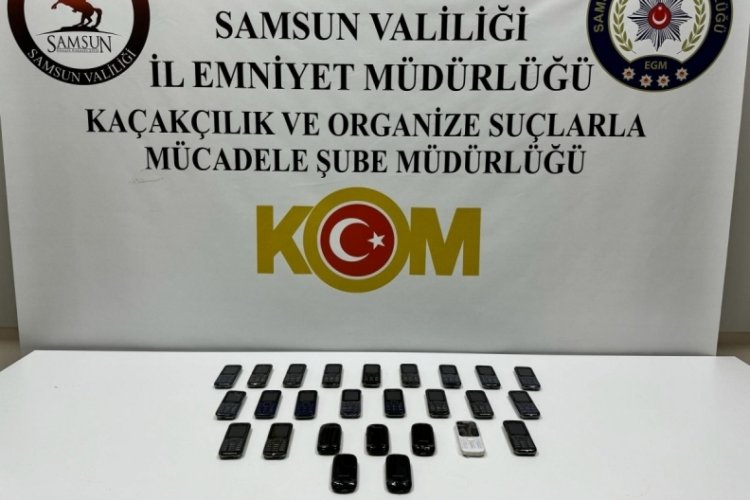 Samsun'da g&uuml;mr&uuml;k ka&ccedil;ağı cep telefonu ele ge&ccedil;irildi
