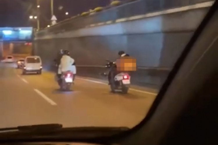 Bursa'da motosikletli kuryenin rahatlığı 'pes' dedirtti