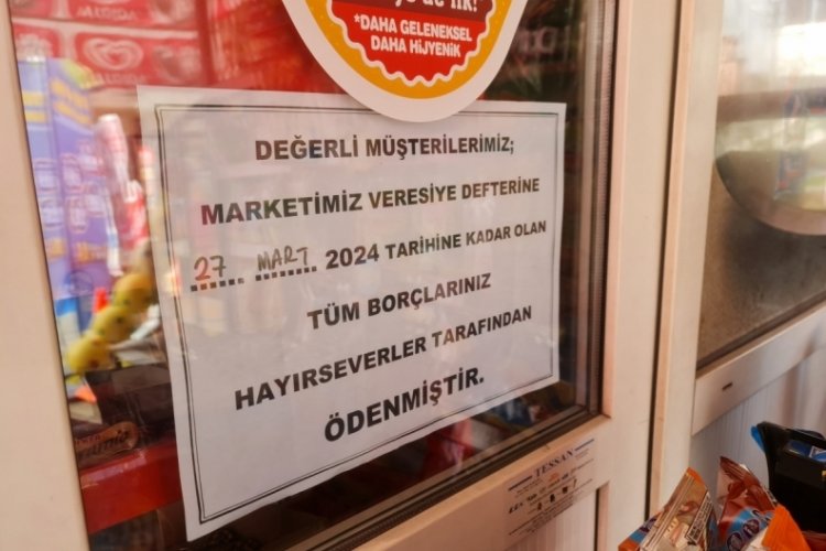 Hayırsever, bakkalın veresiye defterindeki bor&ccedil;ları &ouml;dedi