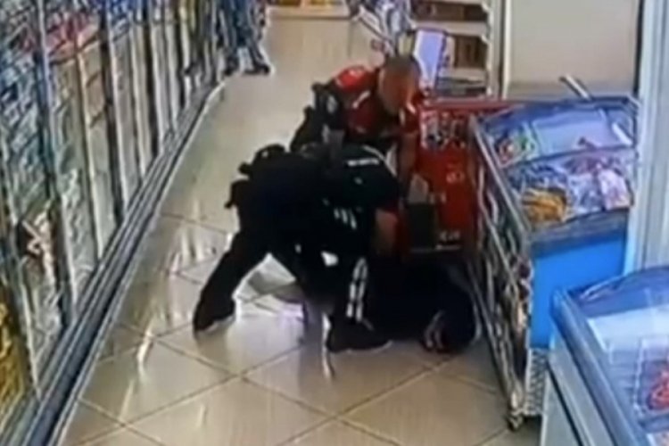 Polise yakalanmamak i&ccedil;in markete girdi ruhsatsız tabancayla yakalandı