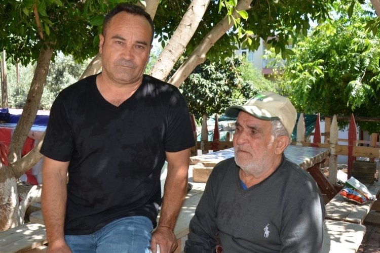 Alevlerin arasından babasını ve kedisini kurtardı