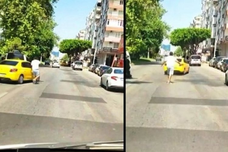 Film gibi olay: Husumetlileri &ouml;n&uuml;n&uuml; kesince m&uuml;şterisi olduğu taksiyi ka&ccedil;ırdı