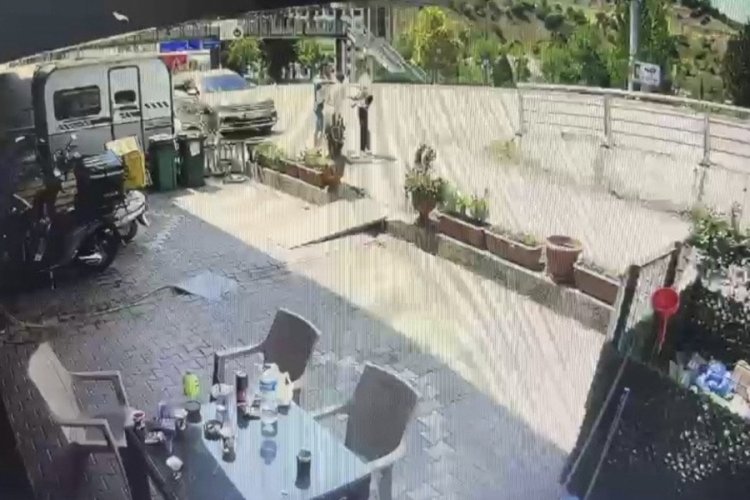 Karab&uuml;k'te bir kişi silahlı saldırıdan saniyelerle kurtuldu