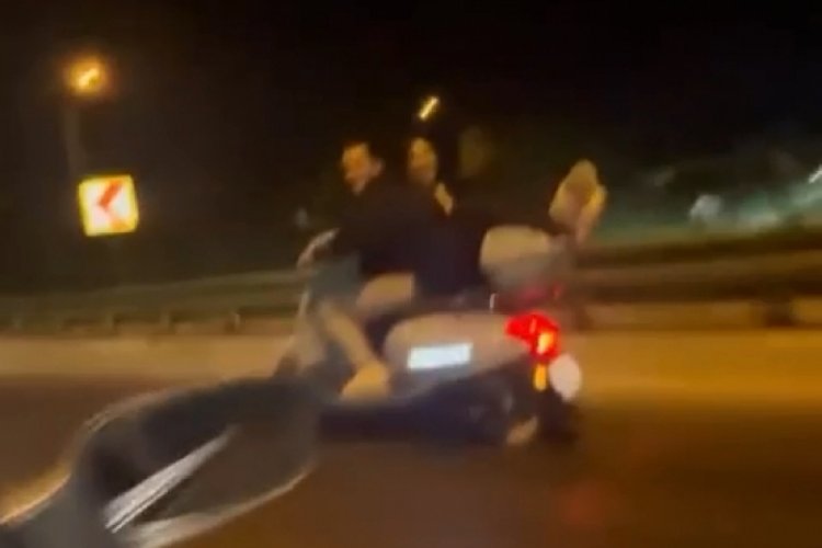 Bursa'da motosikletin arkasında yatarak ilerledi! Canını tehlikeye attı