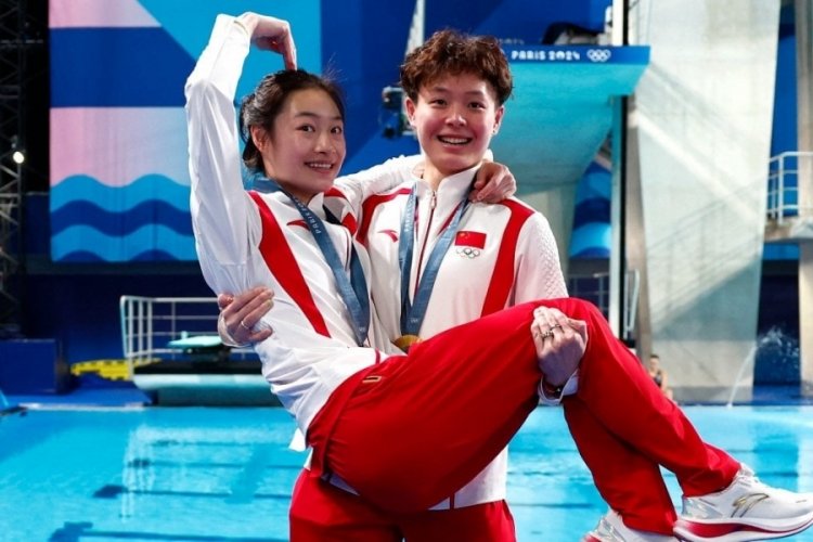 Olimpiyat Oyunları'nda ilk altın madalyaları &Ccedil;in kazandı
