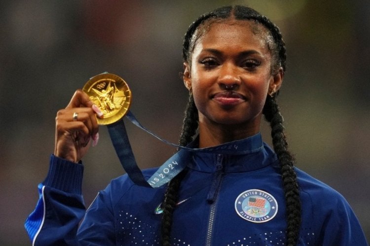 Atletizm kadınlar 100 metre engellide altın madalya Masai Russell'ın