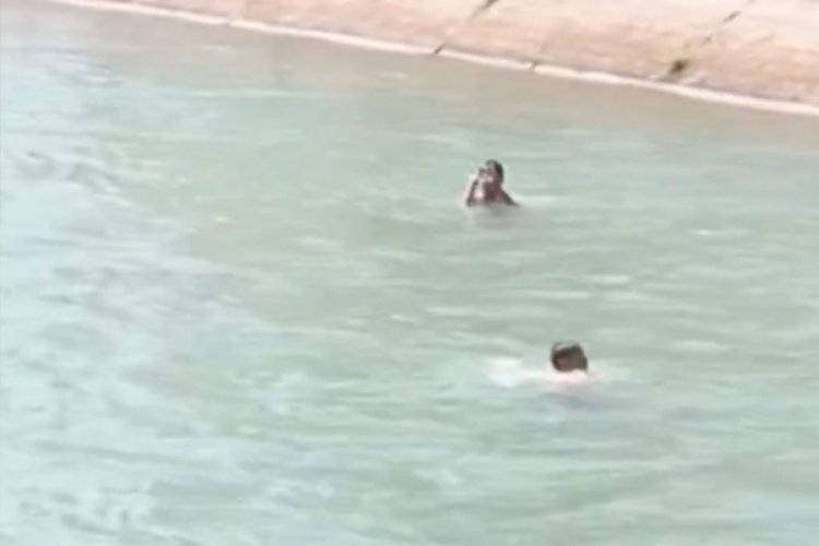Su kanalında y&uuml;zen &ccedil;ocuk: Hayat sinemamız yeni başlıyor, &ccedil;ek