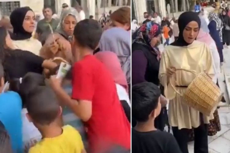 &Ccedil;ikolata dağıtan kadının &uuml;st&uuml;ne &ccedil;ıktılar!
