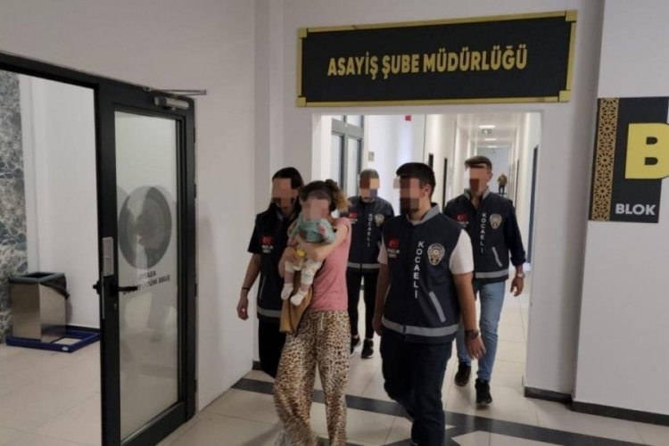 Kocaeli su&ccedil; makinesi kucağında bebekle tutuklandı