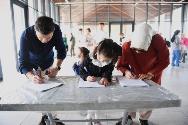 Bursa'da tarihi koşuya katılacak sporseverler numaralarını aldı