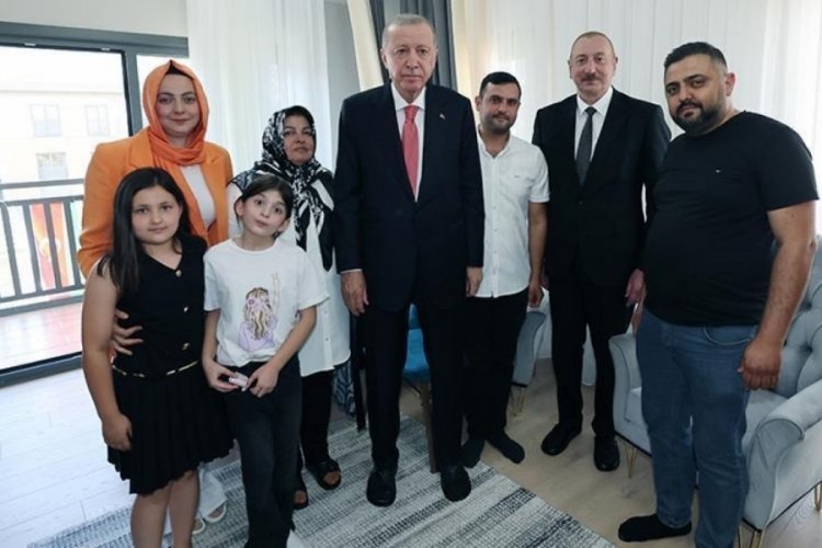 Cumhurbaşkanı Erdoğan'dan depremzede aileye ziyaret
