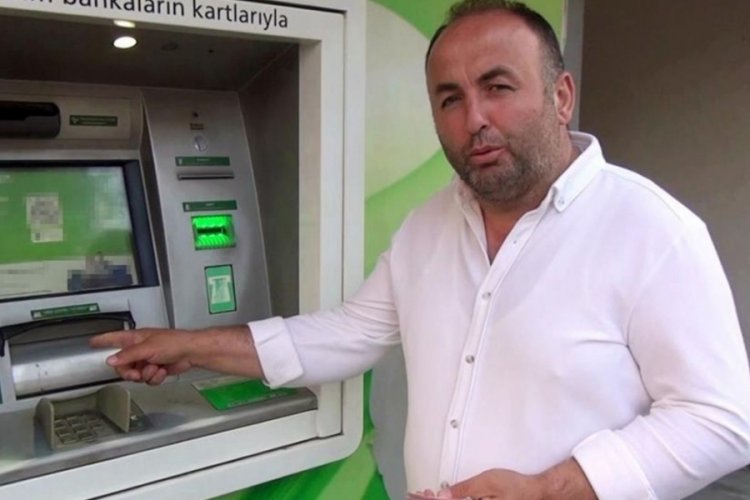 Para yatırmak için gittiği bankamatikte tomarla para buldu