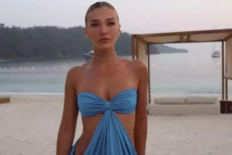 Melisa Döngel cesur elbisesiyle sahile damga vurdu