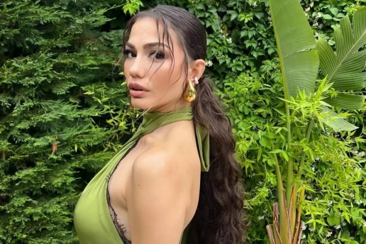 Demet Özdemir havuzda güneş banyosu yaptı