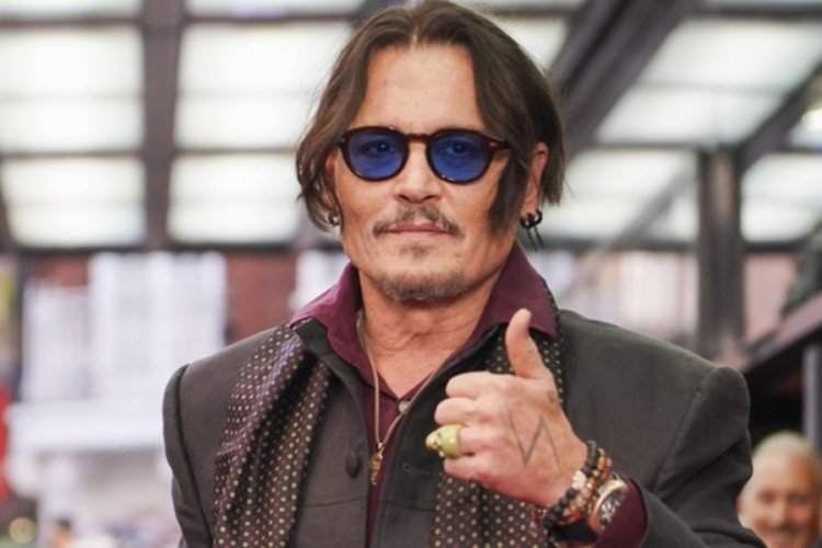 Johnny Depp yönetmenliğini üstlendiği 'Modi' filminin Londra galasına katıldı