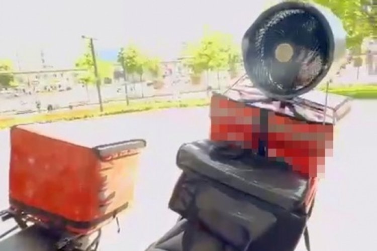 Bursa'da kuryenin sıcak havaya bulduğu çözüm beğeni topladı