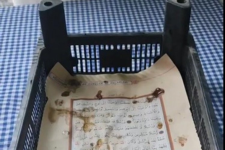 Kuran-ı Kerim'i kasanın altına serdi! Tepkiler çığ gibi...
