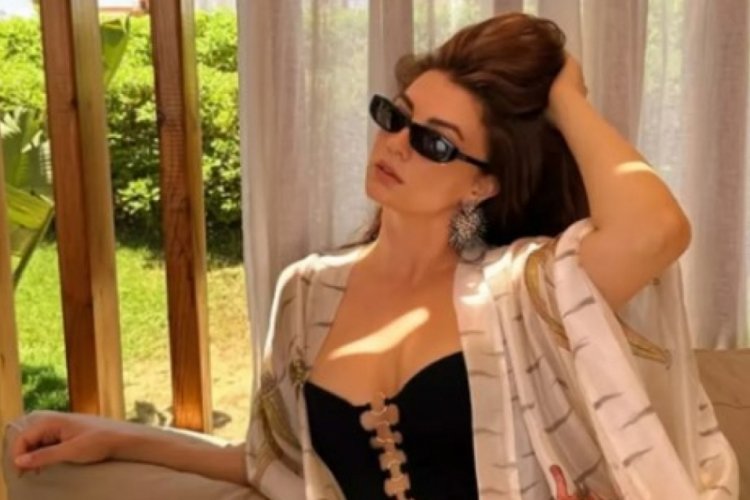  Burcu Özberk başına eşarp taktı!